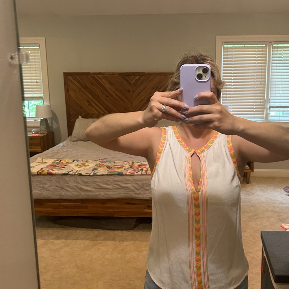 White sleeveless top with bright chevron detailing. Worn 3 times, size small
